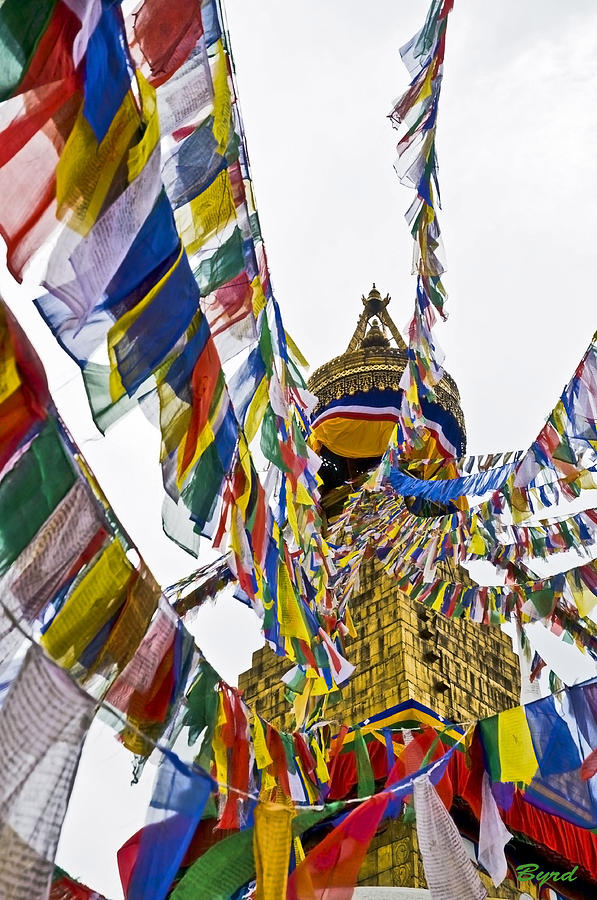 The prayer flags of Boudhanath Stupa Photograph by Christopher Byrd