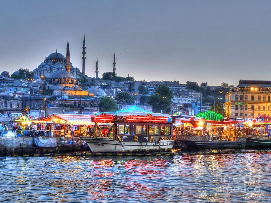 Sunset Photograph - The Riverboats of Istanbul by Michael Garyet