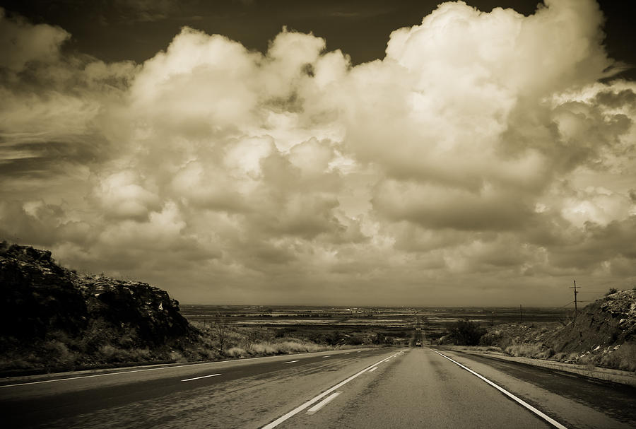 Clouds Photograph - The Road to Roswell by Claudia Botterweg Clouds Photograph - The Road to Roswell by Claudia Botterweg
