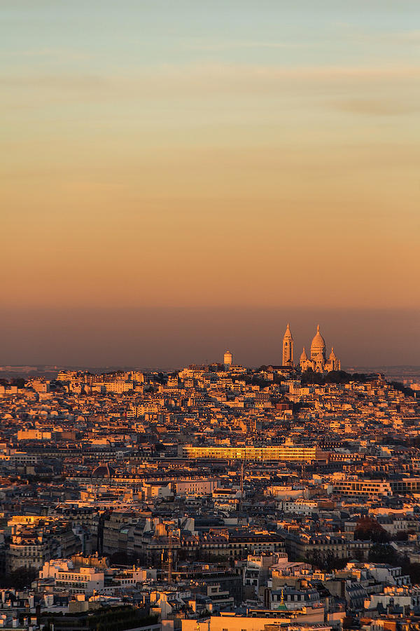The Sacre Coeur, at sunset from the Eiffel Tower. Photograph by Maggie Mccall