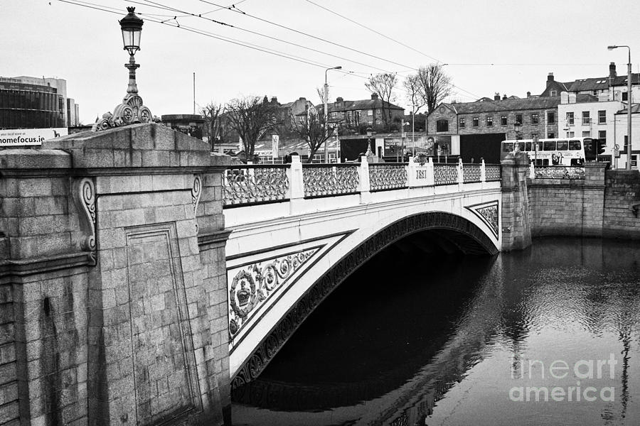 Bridge Photograph - The Sean Heuston bridge formerly the kingsbridge over the river liffey dublin Ireland by Joe Fox