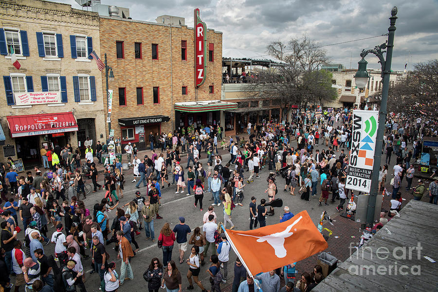 6th Street Photograph - The sights and sounds of SXSW are enormous from 6th Street as th by Dan Herron