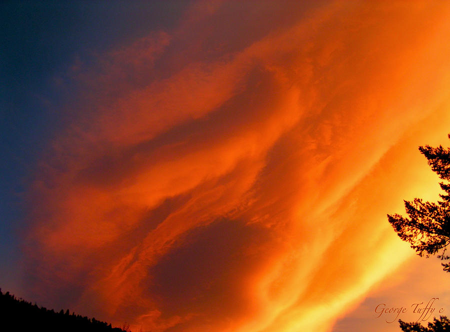 The sky is burning Photograph by George Tuffy