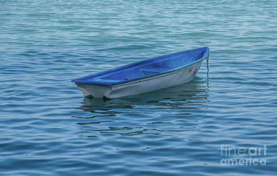 The Small Dinghy Photograph by Michelle Meenawong