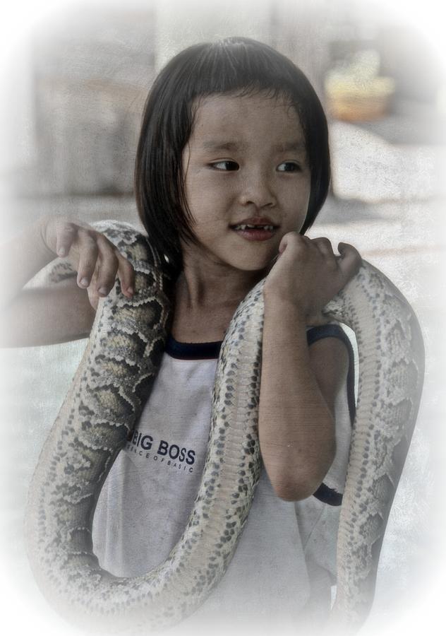Saigon Photograph - The Snake Charmer by Toni Abdnour