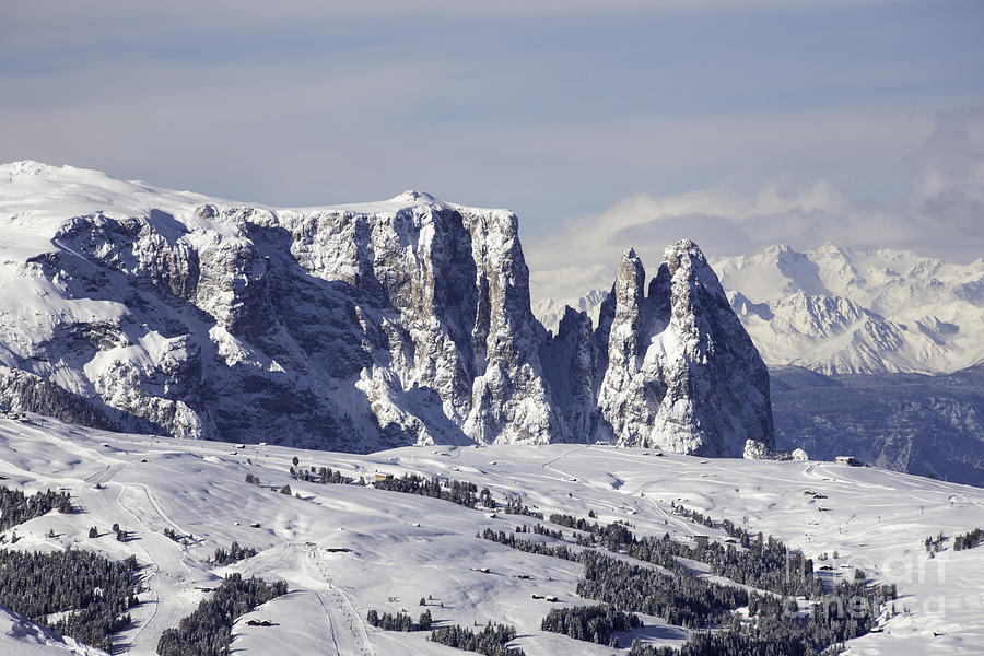 The snow capped peaks of The Sciliar Schlern and outcrops of Satner Val Gardena Dolomites Italy Photograph by Michael Walters