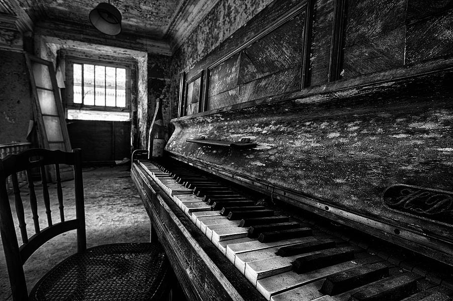 The sound of the past - old piano in abandoned hotel BW Photograph by Dirk Ercken