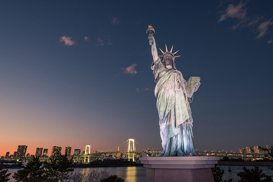 Sunset Photograph - The Statue of Liberty - Tokyo, Japan - Travel photography by Giuseppe Milo