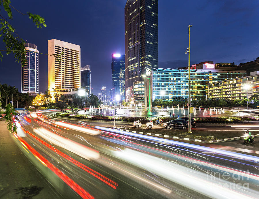 The streets of Jakarta at night in Indonesia capital city.  Photograph by Didier Marti
