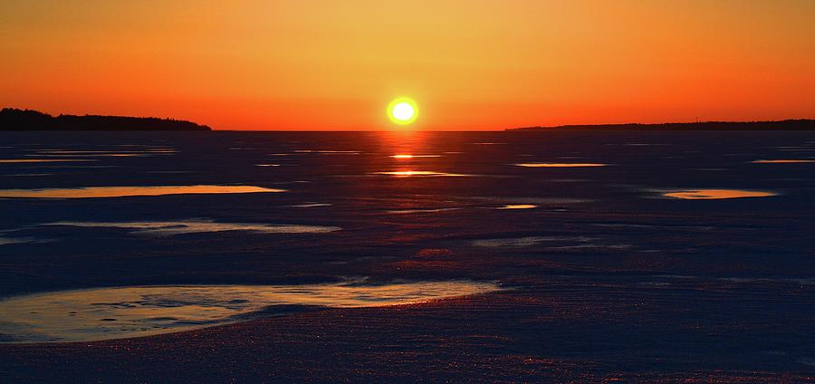 The Sun Above The Horizon Photograph by Lyle Crump
