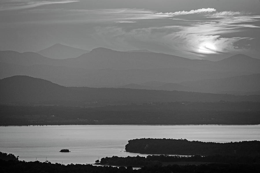 The sun goes down over Lake Champlain and the Adirondacks from Mount Philo Charlotte Vermont BW Photograph by Toby McGuire