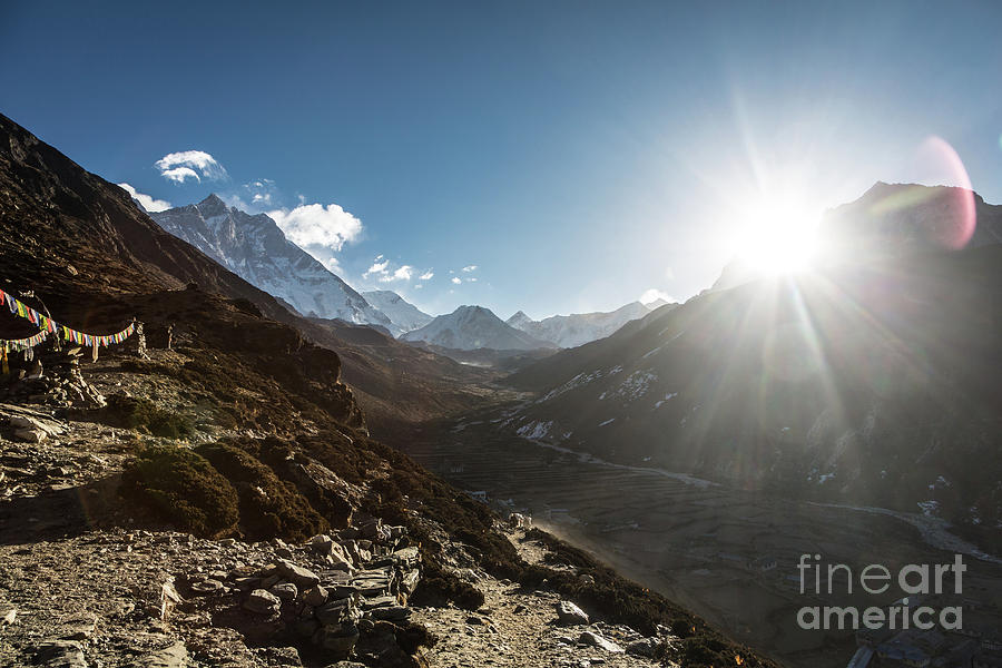 The sun rises above the Dingboche village in Nepal Photograph by Didier Marti