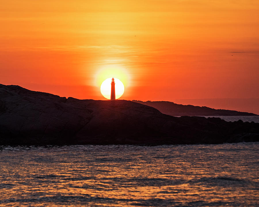The Sun Rises Behind Thacher Light Rockport MA Photograph by Toby McGuire