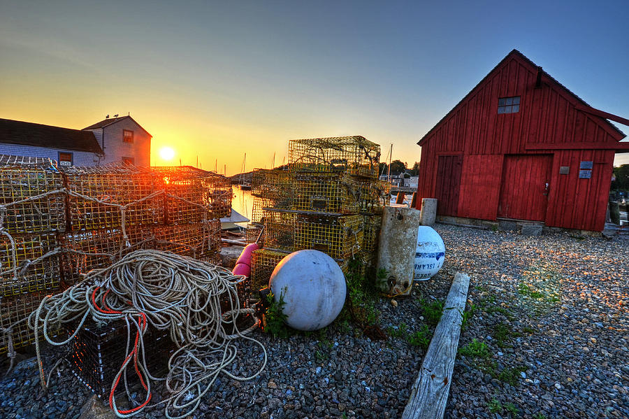 The sun rising by motif 1 in Rockport MA Bearskin neck lobster traps Photograph by Toby McGuire