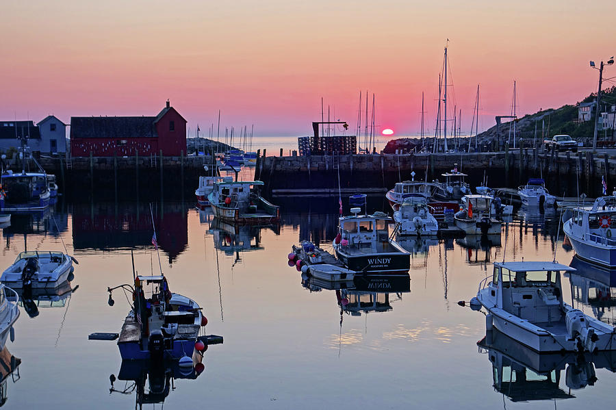 The sun rising on Rockport Harbor and Motif number 1 Photograph by Toby McGuire