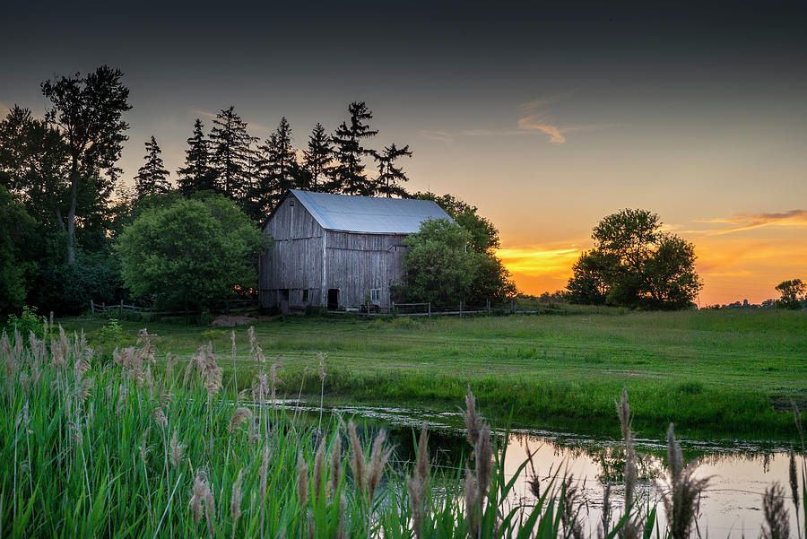 The Sunset Behind the Barn Photograph by Brent Buchner