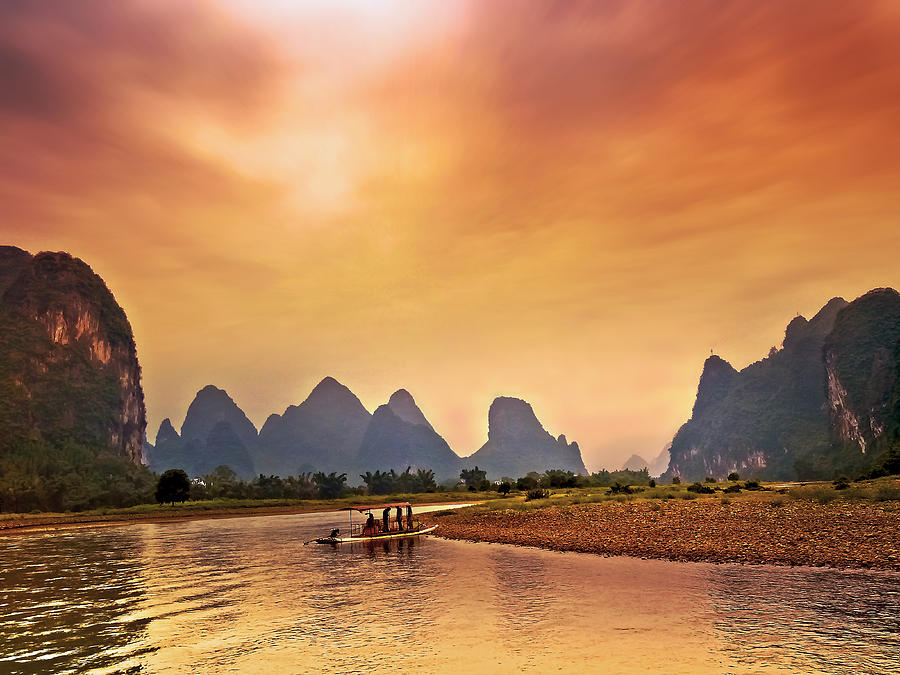 The sunset is fine but it is near dusk-China Guilin scenery Lijiang River in Yangshuo Photograph by Artto Pan