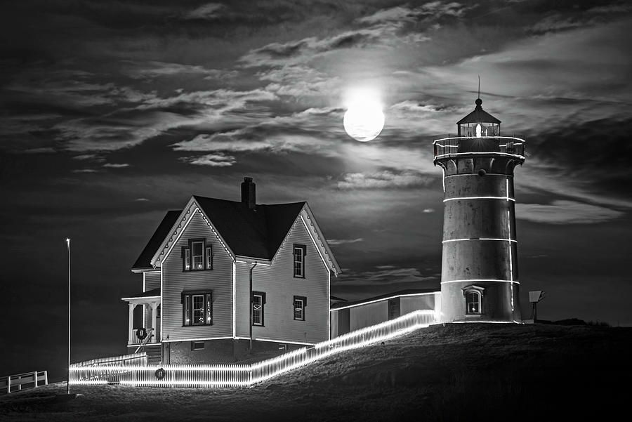 The supermoon rising over the Nubble Lighthouse York Maine Black and White Photograph by Toby McGuire