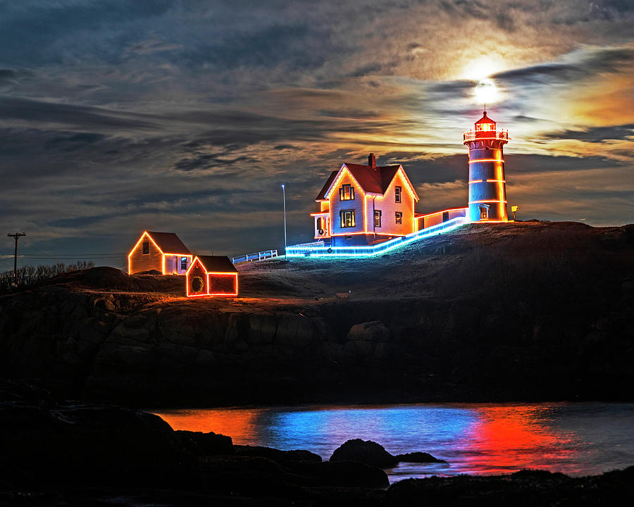 The supermoon rising over the Nubble Lighthouse York Maine Reflection Photograph by Toby McGuire