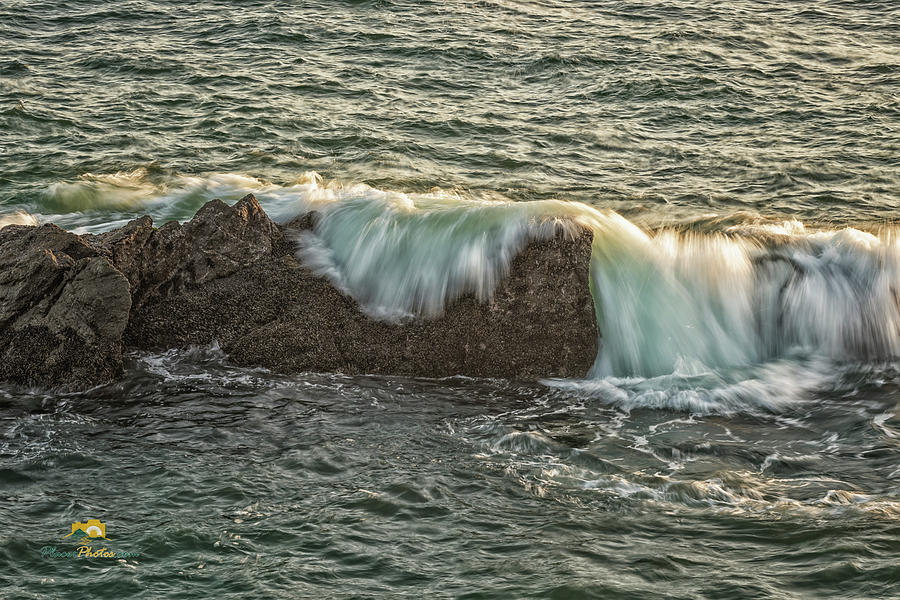 The Surf Spilling Over an Obstical Photograph by Jim Thompson