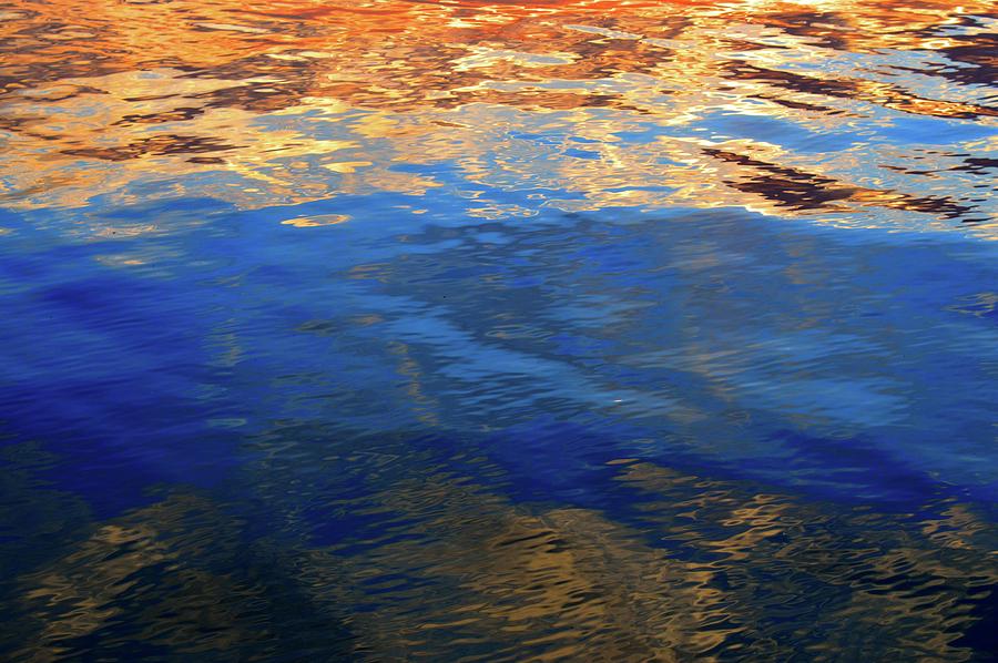 The Surface Is A Reflection  Photograph by Lyle Crump