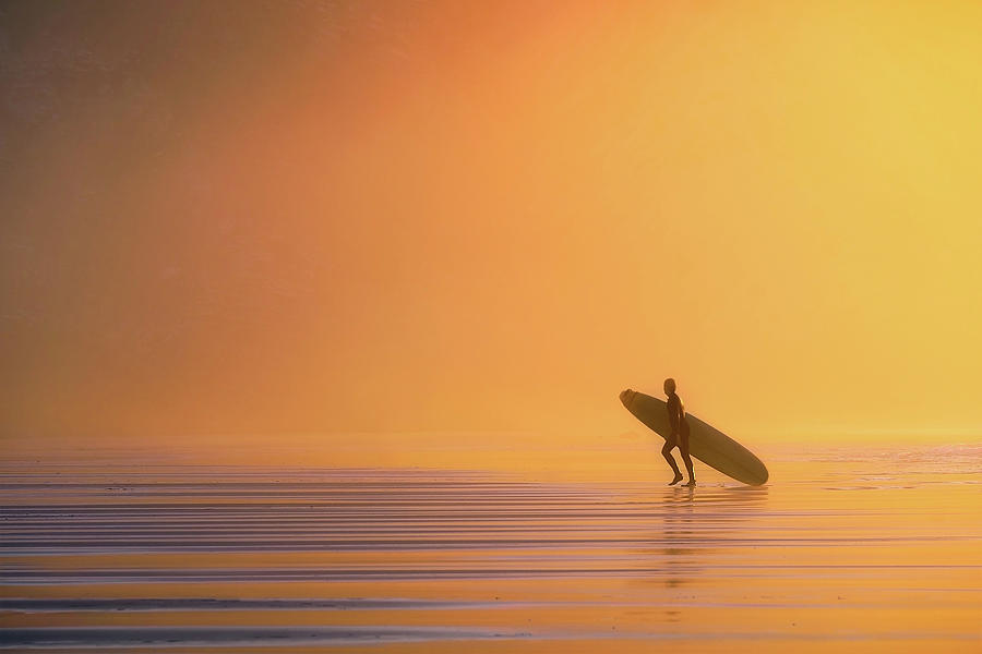 Sunset Photograph - The Surfer by Mikel Martinez de Osaba