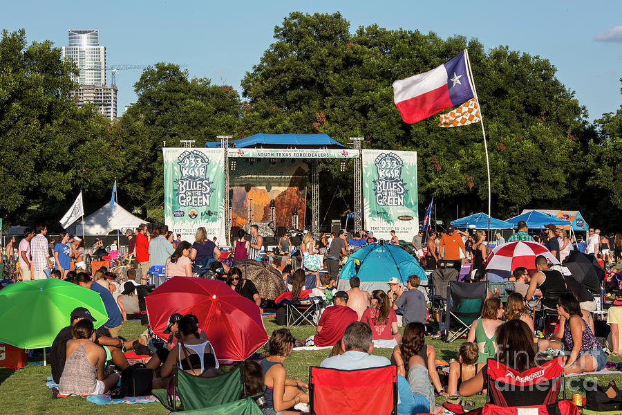 Summer Photograph - The Texas flag flies in the hot summer breeze at Austins Blues on the Green, a favorite summer concert tradition in Austin by Dan Herron