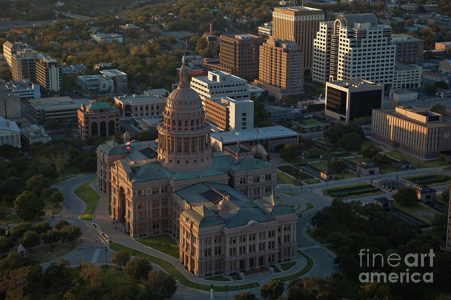 Helicopter Photograph - The Texas State Capitol Building, in Austin Texas, photographed in the warm afternoon sunset by Dan Herron