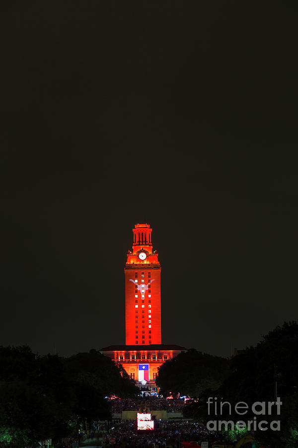 The University Of Texas Photograph - The University of Texas graduation ceremony paints the UT Tower  by Dan Herron