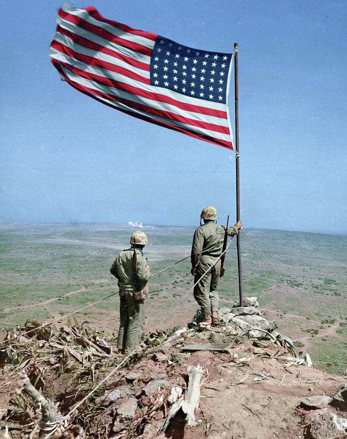 The US flag flies over Iwo Jima Photograph by Jared Enos - Fine Art America