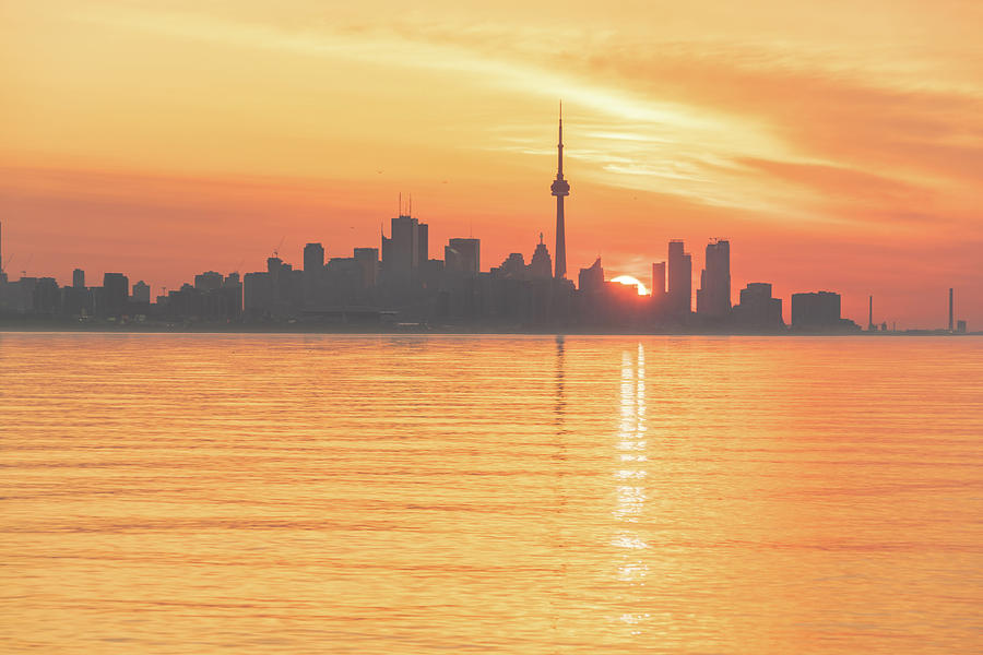 The Wait is Over - Split Sunrise Behind Toronto Skyline Photograph by Georgia Mizuleva