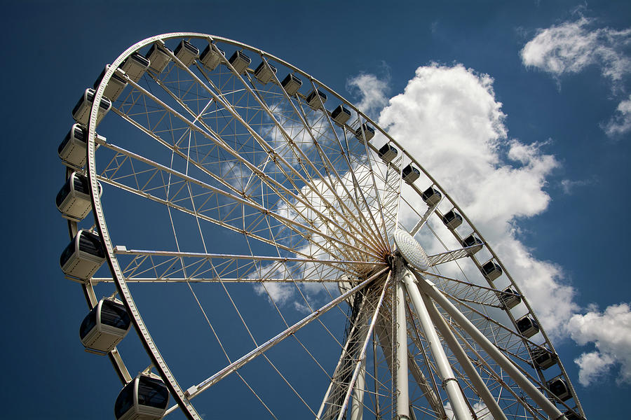 The Wheel And Sky Photograph by Greg and Chrystal Mimbs