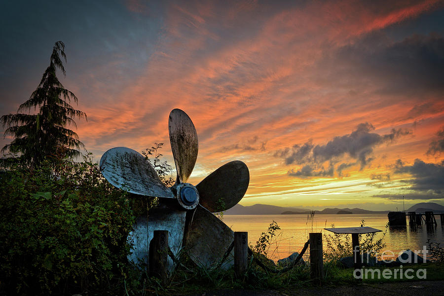 Sunset Photograph - The Wheel by Charity Hommel