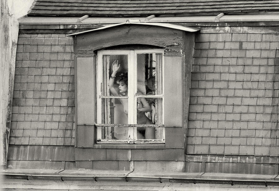 The woman at the window Photograph by Philippe Taka