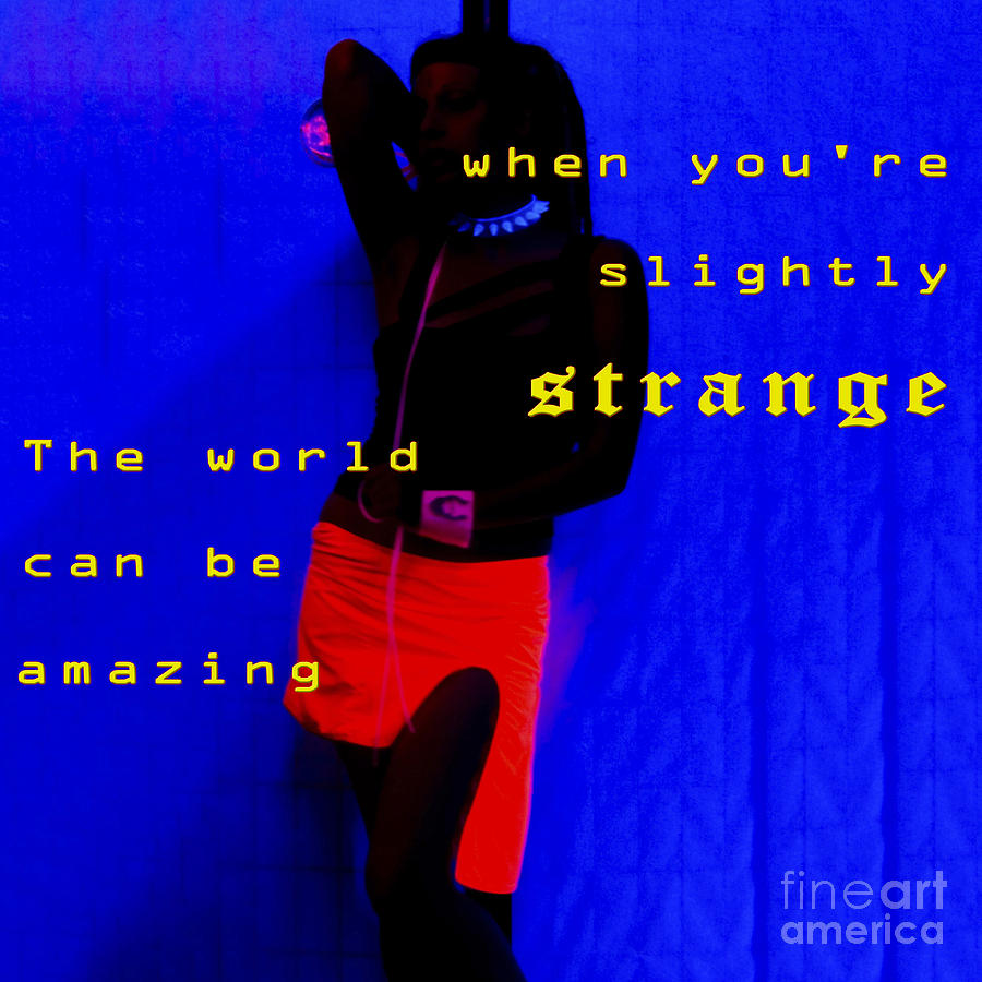 The world can be amazing when youre slightly strange Photograph by Humorous Quotes