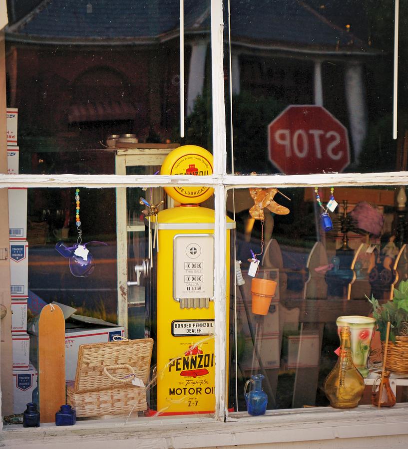 There is a Gas pump in the Window Photograph by Rodney Lee Williams