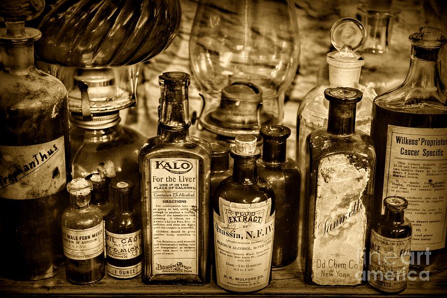 Those Old Apothecary Bottles in Sepia Photograph by Paul Ward