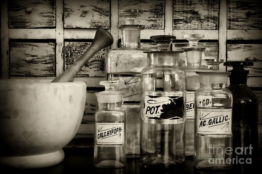 Those Old Pharmacy Bottles in Black and White Photograph by Paul Ward