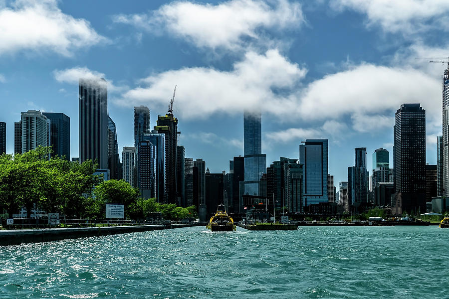 Though the locks looking back at the Chicago Skyline  Photograph by Sven Brogren