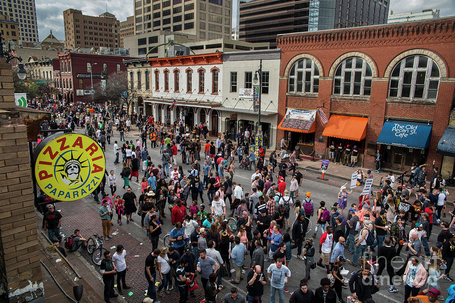 Holiday Photograph - Thousands of attendees fill 6th Street during SXSW where you are by Dan Herron