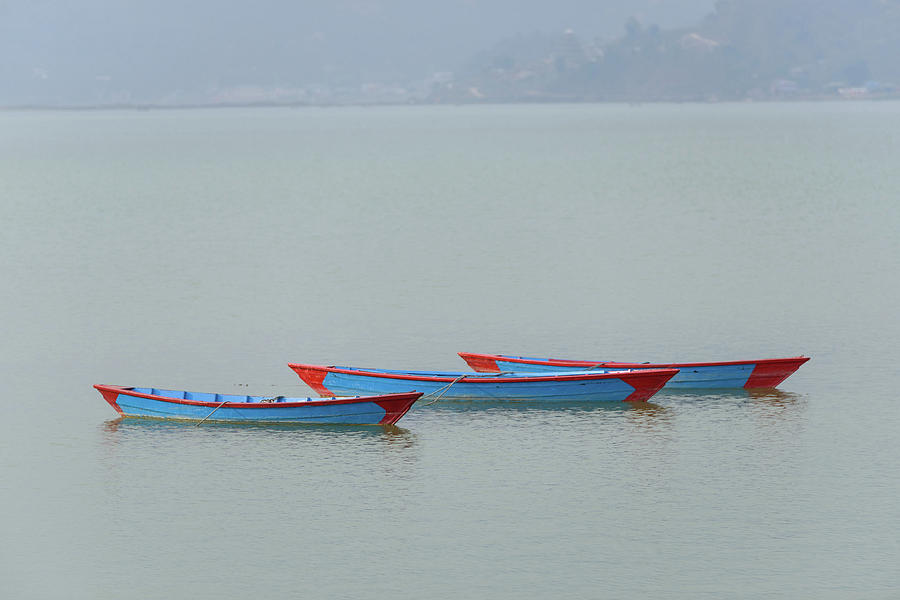 Three blue boats on Phewa Lake in Pokhara Photograph by Dutourdumonde Photography