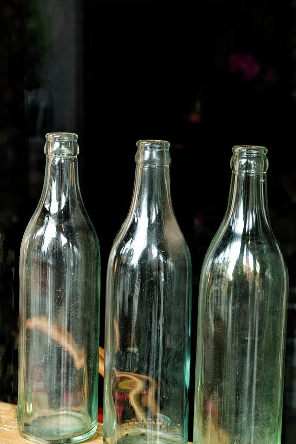Three Bottles Photograph by Tom Singleton