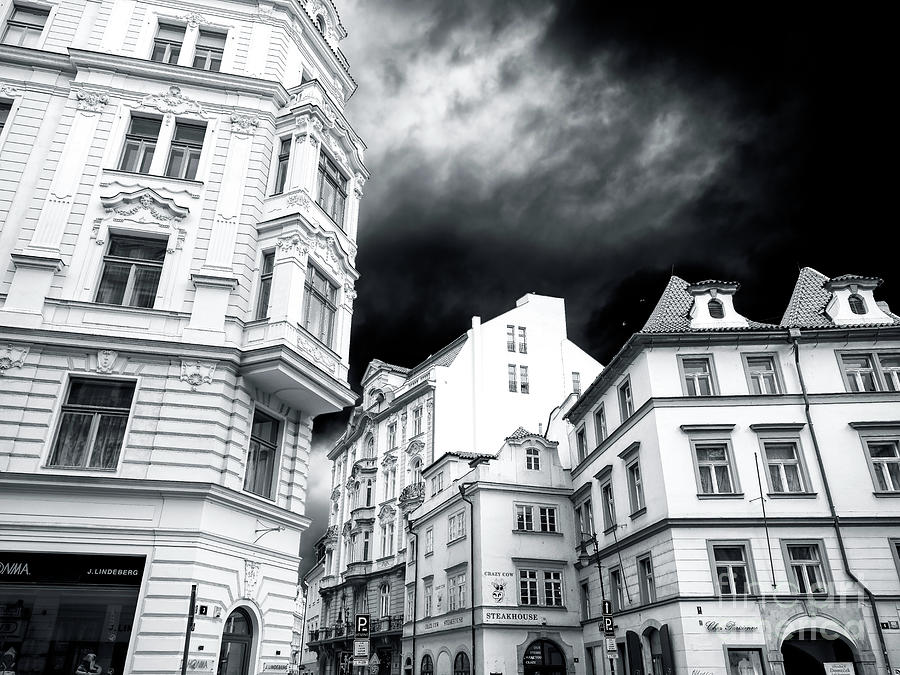 Three Buildings in Prague Photograph by John Rizzuto