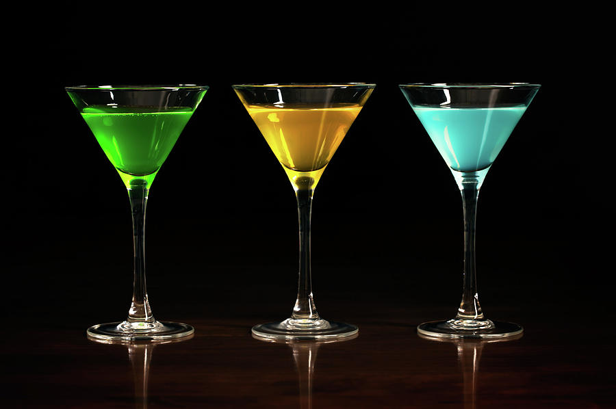 Three Glasses Of Different Alcohol Cocktails Photograph