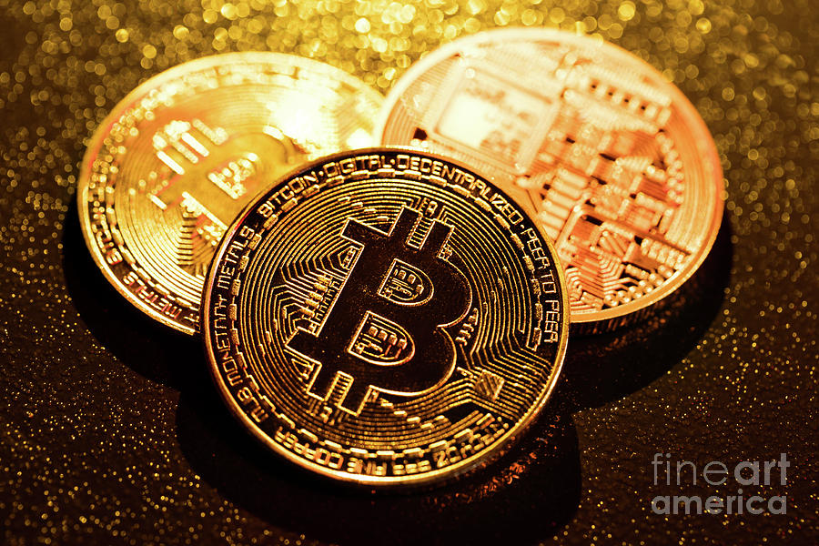 Coin Photograph - Three golden bitcoin coins on black background. by Michal Bednarek