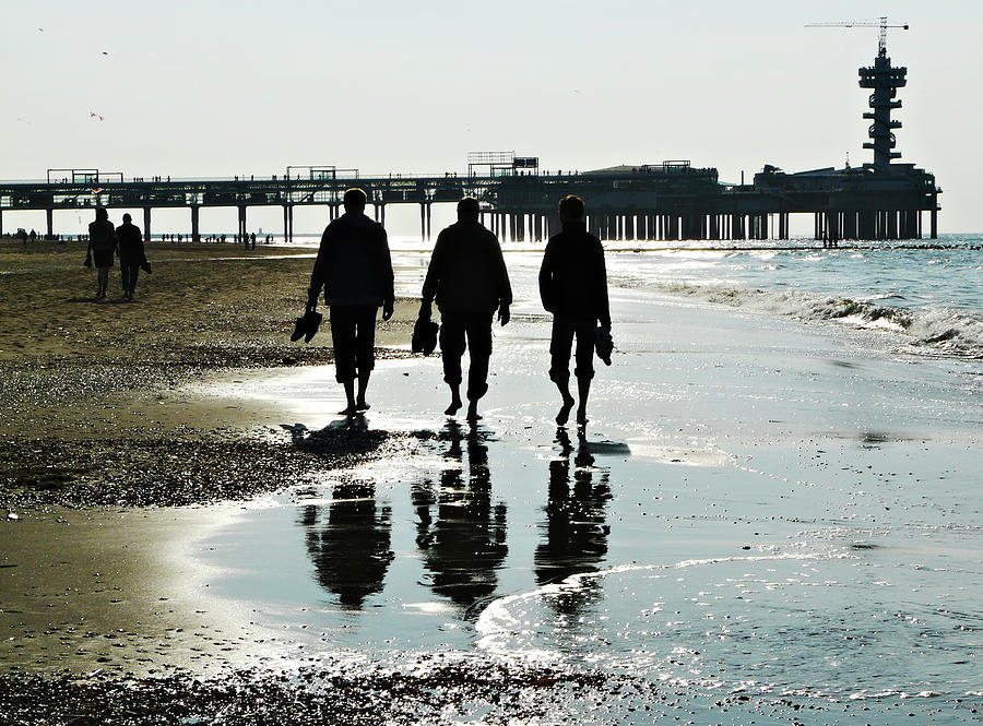 Three guys on a beach Photograph by Lin Van der Heiden - Fine Art America