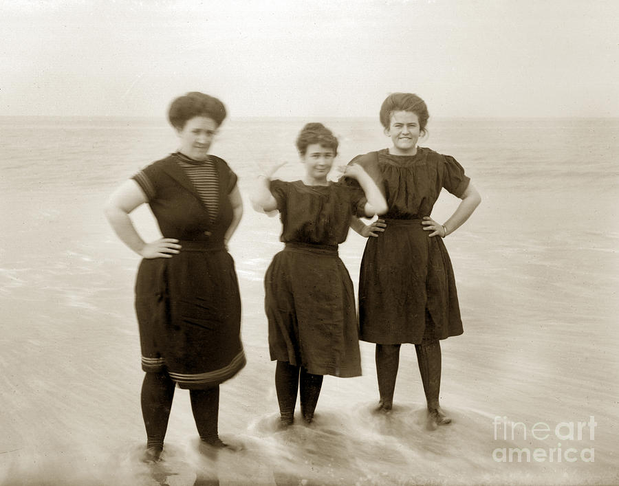 Vintage Photograph - Three ladies Bathing in early Bathing Suit on Carmel Beach early 20th Century. by Monterey County Historical Society