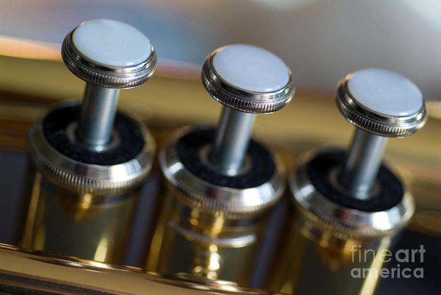 Three musical keys on a shiny trumpet Photograph by Sami Sarkis
