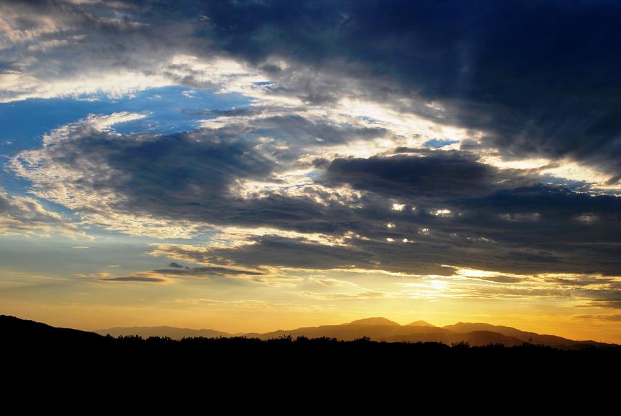 Nature Photograph - Three Peak Sunset Swirl Skyscape by Matt Quest