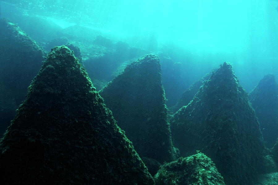 Three peak underwater rock formations in the Mediterranean Sea